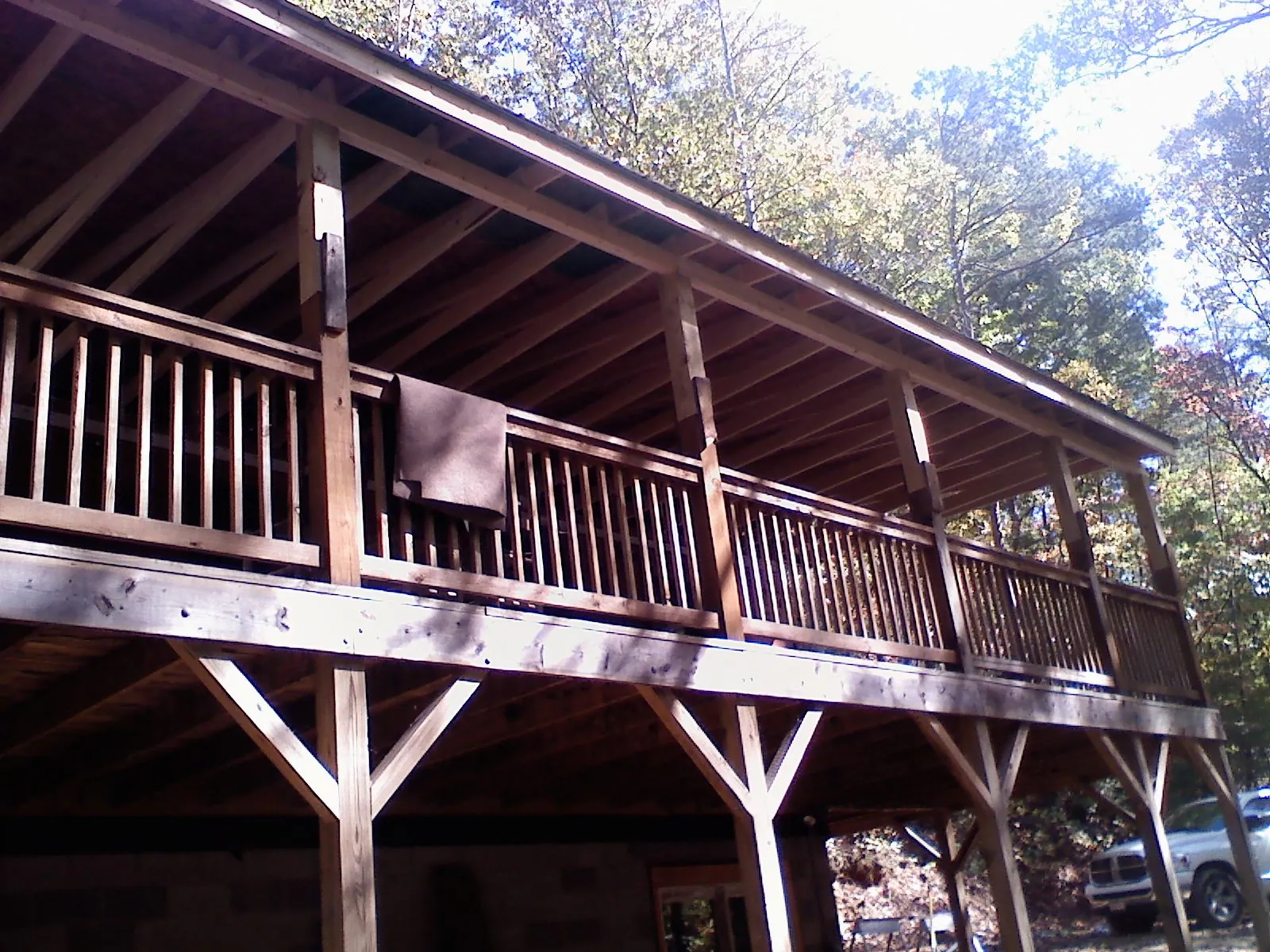Timber framing under a new elevated porch and deck — Roof Leak Repair in Timber by Roofing Brothers